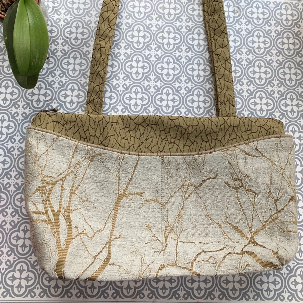 Roomy MARUCA shimmery gold shoulder bag